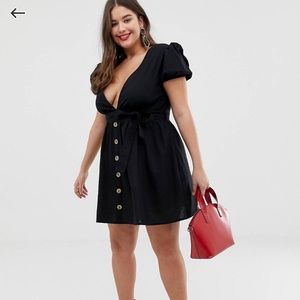 Black mini dress with puff sleeve and button front
